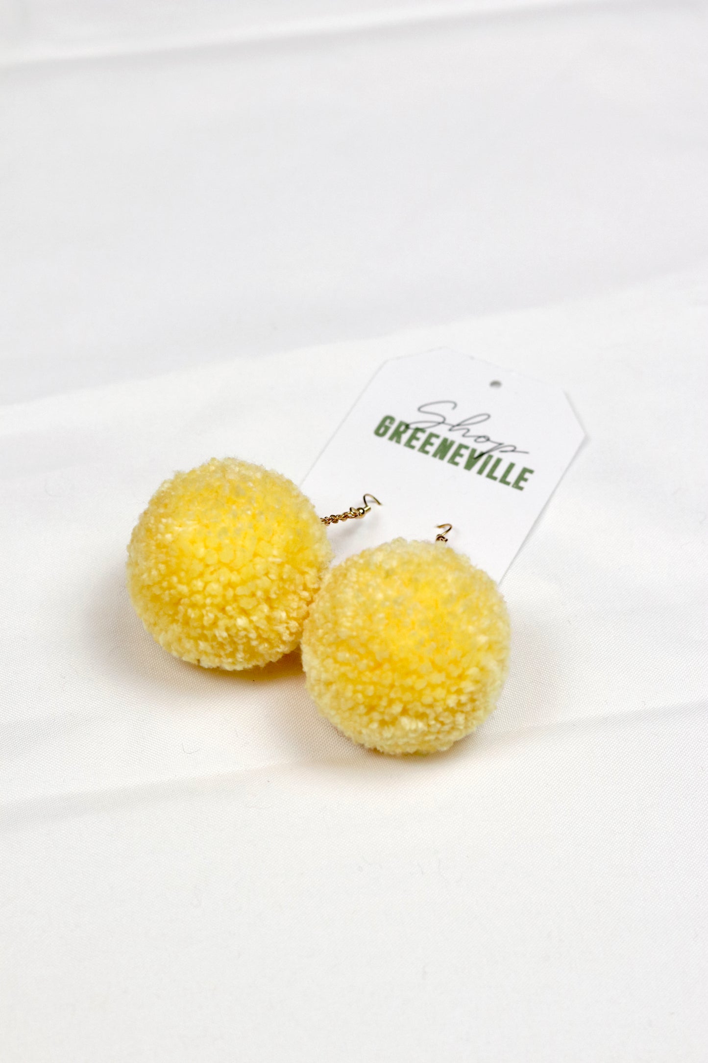 Game-day Pom earrings